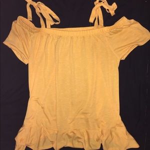 Cute yellow/ gold over the shoulder summer top!